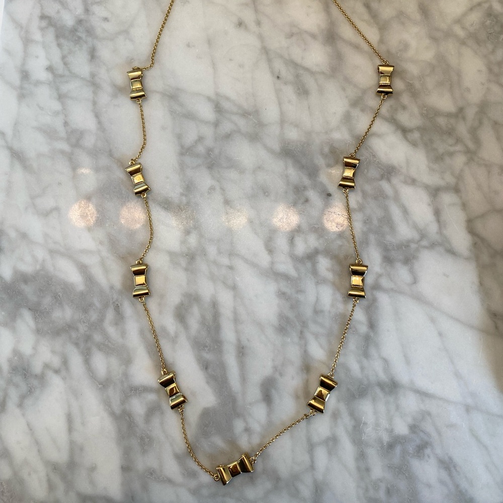 Like new Kate Spade gold bow necklace